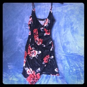 Black mini dress with flower print.